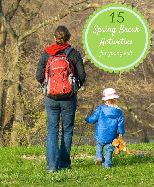 Image of parent and child walking in the woods for a post on Spring Break Activities